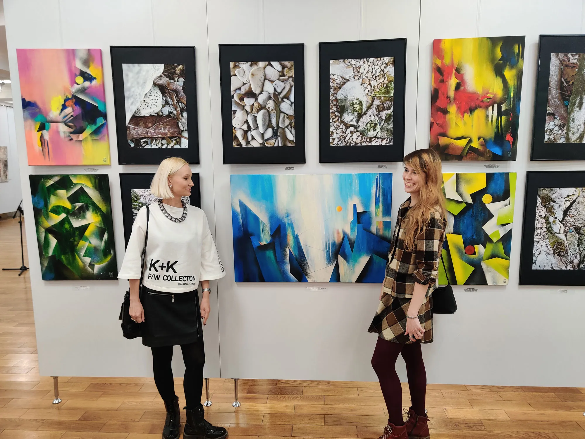 Artists Yulia Latysheva and Anastasia Ivanova in front of their works in the New Space gallery, Samara, Russia